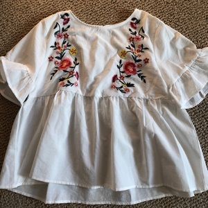 white embroidered shirt